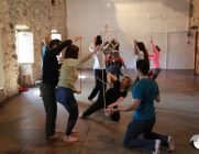 Roy Hart Theatre Teachers week 2017 group movement class using sticks